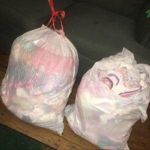2 bags full of baby girl clothes